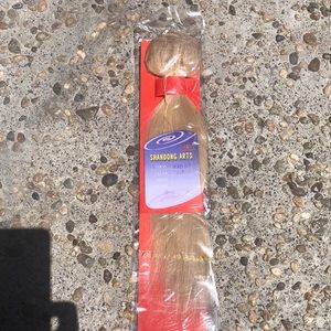 100% human hair wefts, light golden blonde